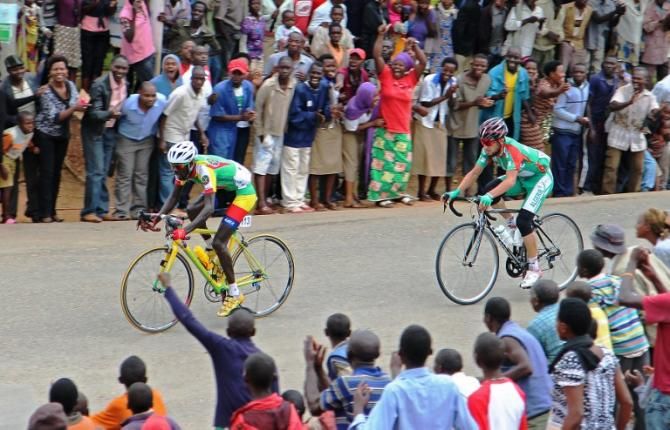 Cyclists pass crowds of spectators in Nyamagabe during the fifth edition of the Tour of Rwanda