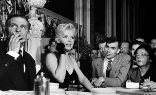 Marilyn Monroe and Laurence Olivier in black and white archive photo