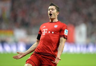 Robert Lewandowski celebrates after scoring a hat-trick for Bayern Munich against Wolfsburg in September 2015.