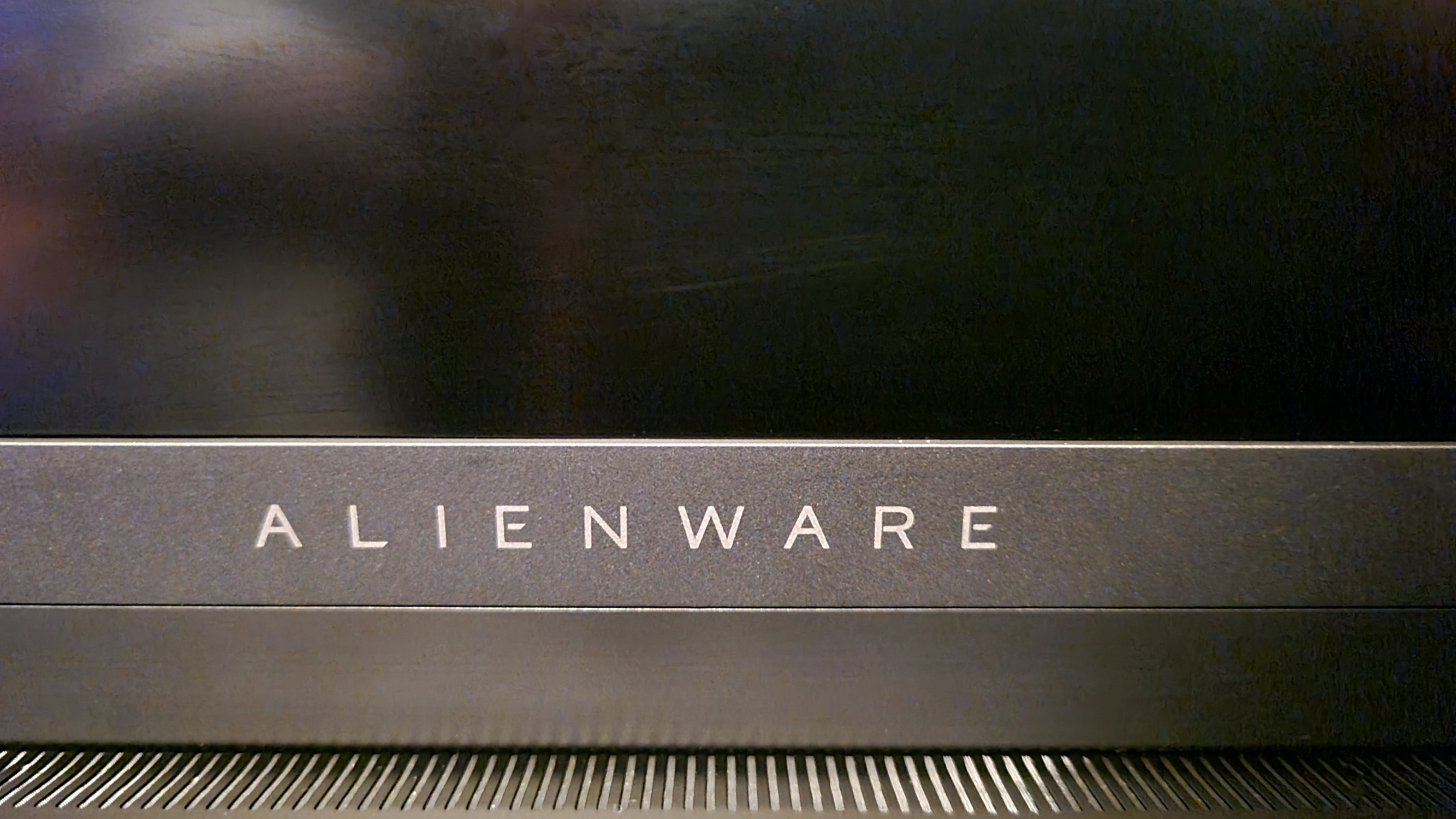 Alienware x16 on a wooden desk