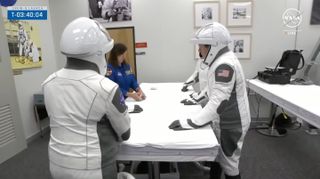 The four astronauts of SpaceX's Crew-8 mission play cards on March 3, 2024, a prelaunch tradition for crewed missions.