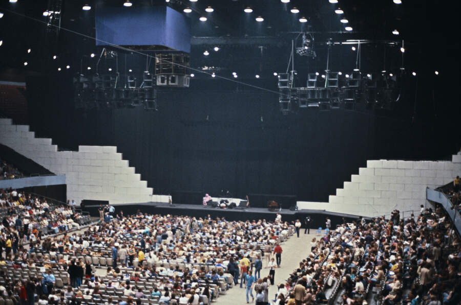 The audience and stage set for a concert on Pink Floyd's The Wall Tour, circa 1980.