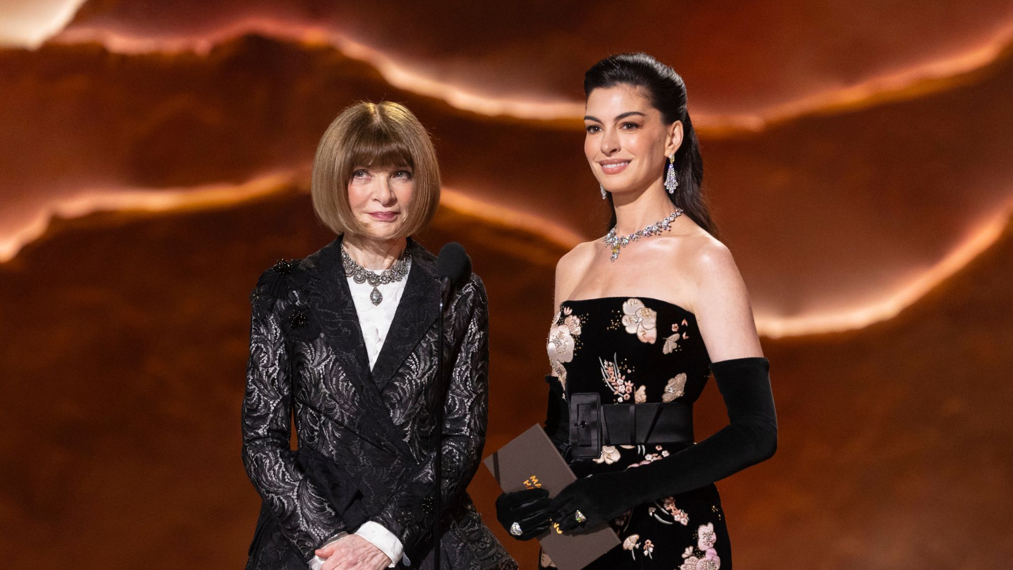 Anna Wintour and Anne Hathaway present at the Academy Awards in 2026