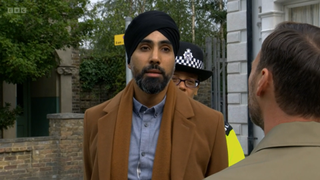 Kheerat Panesar being arrested by police