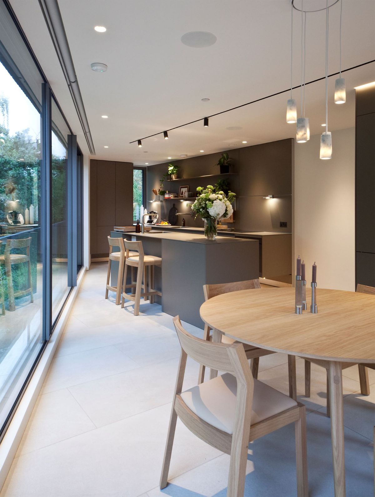 A wooden dining room table with chairs