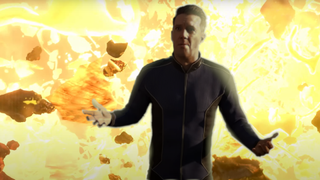 An edited screenshot of the Super Earth spokesperson shrugging in bewilderment as an explosion detonates behind him.