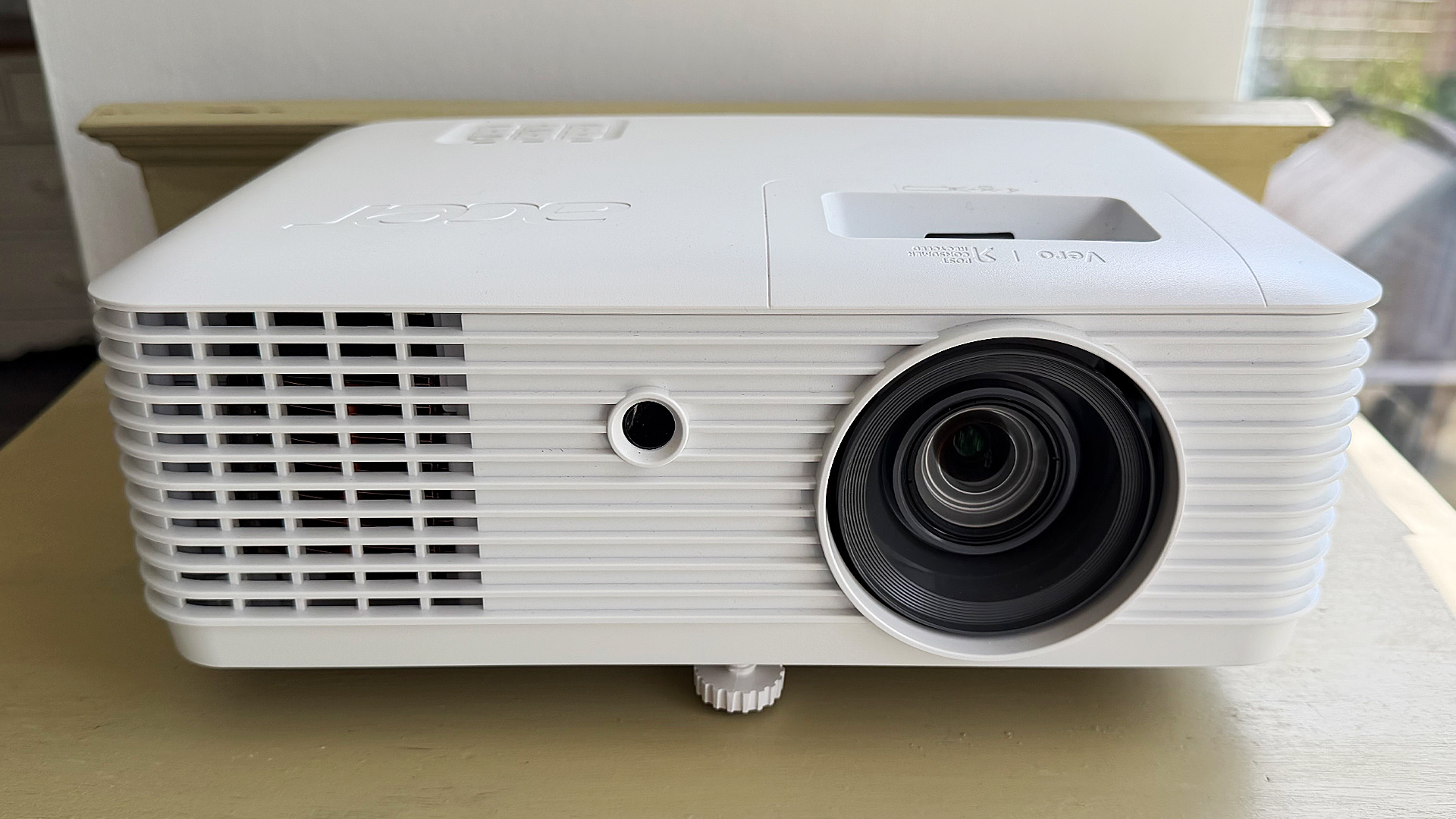 Acer Vero HL6810ATV home cinema projector on wooden furniture
