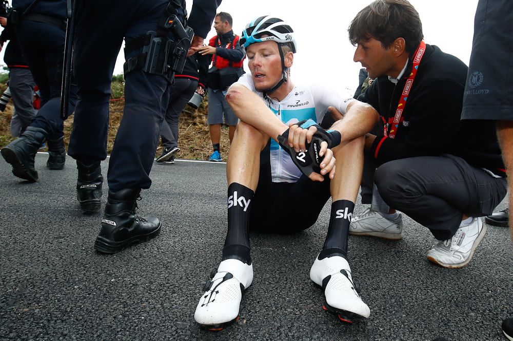 Dylan Van Baarle (Team Sky) sits on the ground following a crash after the finish of stage 12 at the Vuelta