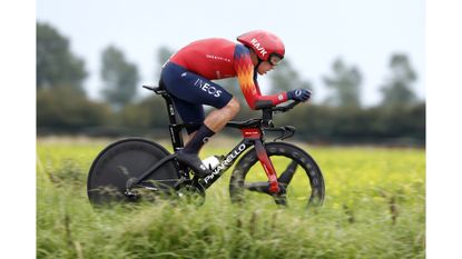Team Ineos Grenadiers cyclist Cameron Wurf competes in the individual Time Trial with a side-on picture. 