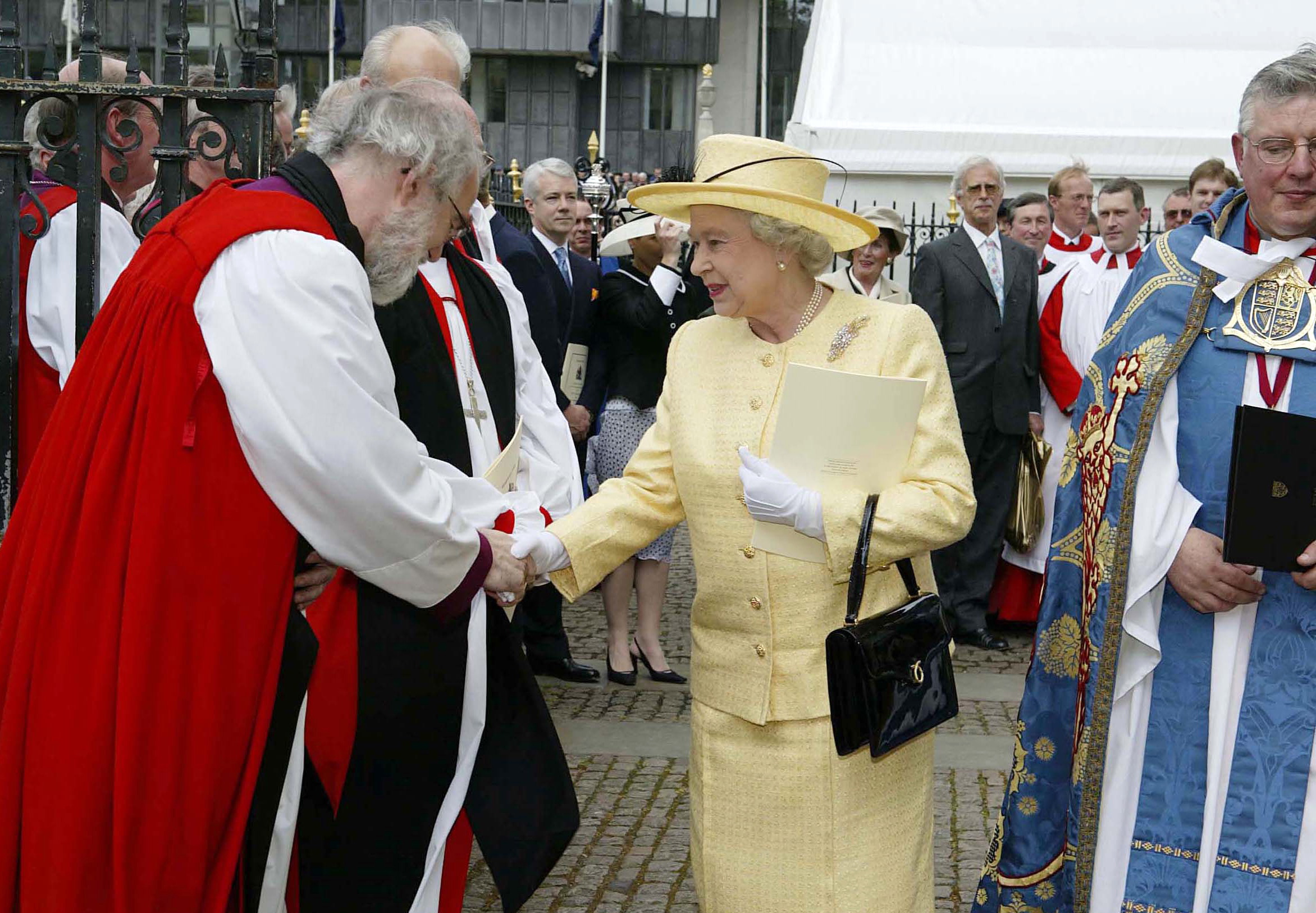 Queen Elizabeth Il Shaking Hands With Doctor Rowan Williams, Archbishop Of Canterbury, After Attending A Special Service To Commemorate The 50th Anniversary Of Her Coronation At Westminster Abbey. 
