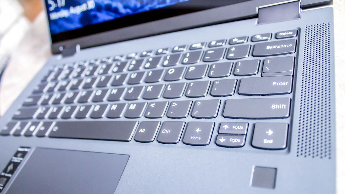 A close up of a gray laptop keyboard