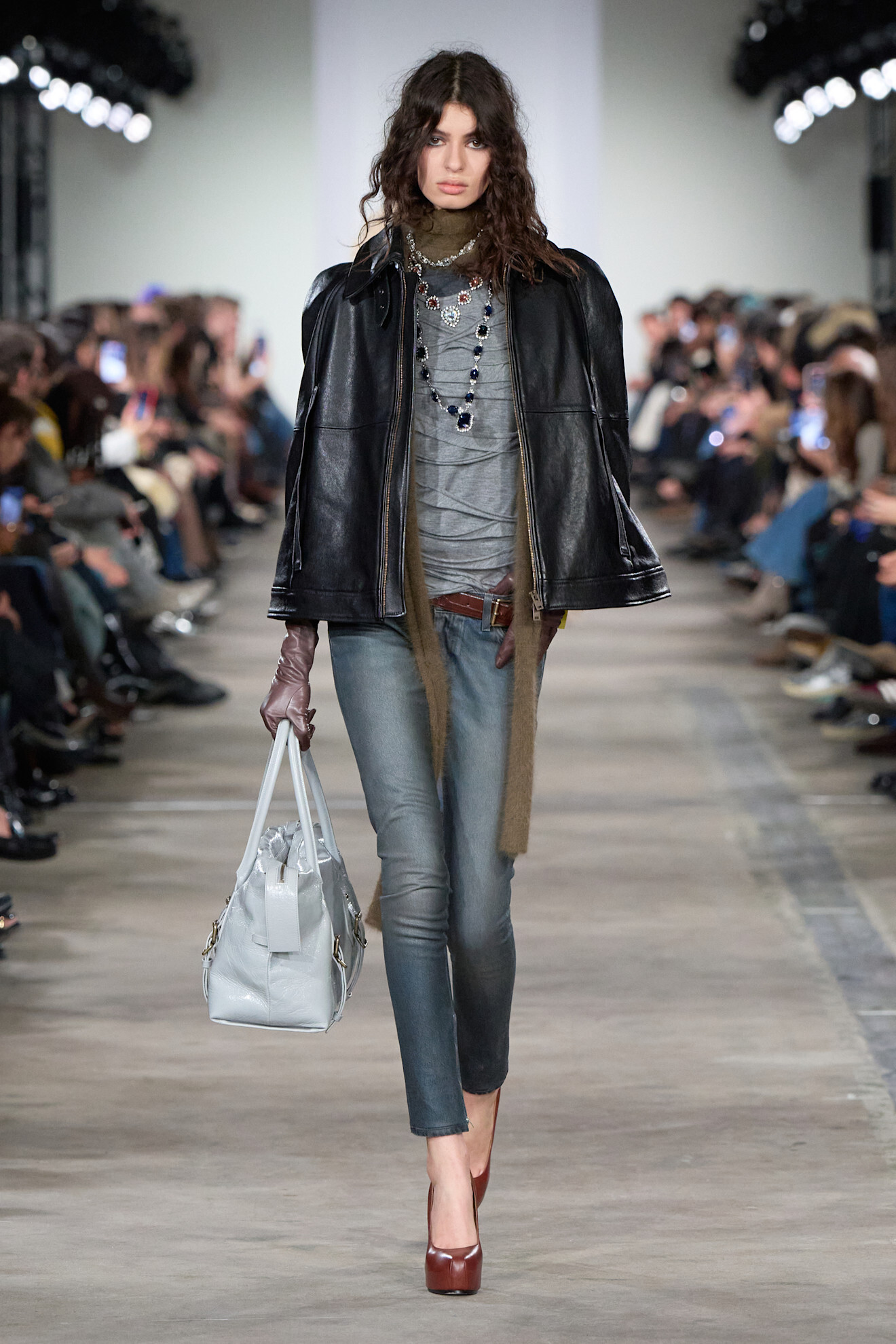 A model walking in skinny jeans on the 7 for All Mankind runway