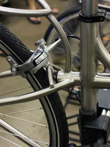 The seat stay yoke clamps around a short stub on the back of the seat tube. A short welded bridge provides the mounting point for the rear brake caliper.