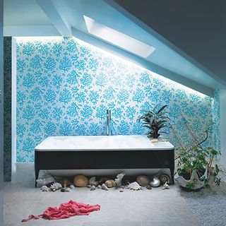 aqua blue bathroom with stone floor