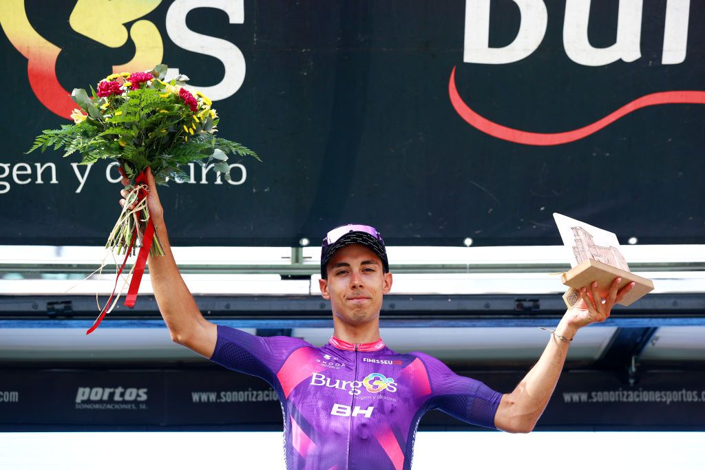 BURGOS SPAIN AUGUST 15 Angel Fuentes Paniego of Spain and Team BurgosBH celebrates at podium as winner of the trophy for best Burgales during the 45th Vuelta a Burgos 2023 Stage 1 a 161km stage from Villalba de Duero to Burgos on August 15 2023 in Burgos Spain Photo by Gonzalo Arroyo MorenoGetty Images