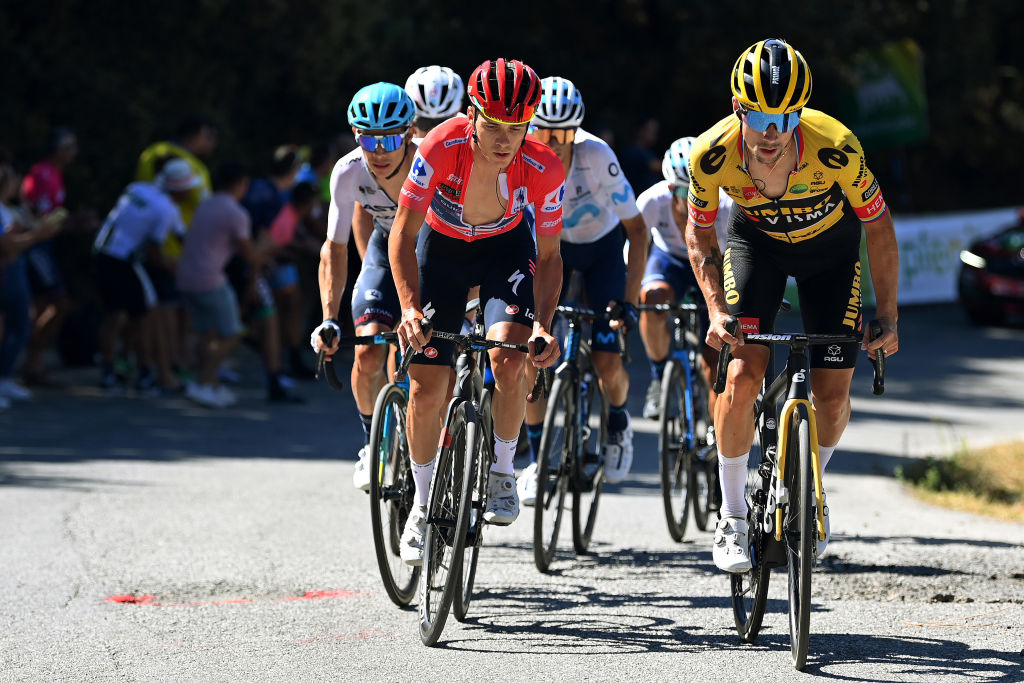 SIERRA NEVADAGRANADA SPAIN SEPTEMBER 04 LR Miguel ngel Lpez Moreno of Colombia and Team Astana Qazaqstan Remco Evenepoel of Belgium and Team QuickStep Alpha Vinyl Red Leader Jersey and Primoz Roglic of Slovenia and Team Jumbo Visma compete in the chase group during the 77th Tour of Spain 2022 Stage 15 a 1526km stage from Martos to Sierra Nevada Granada 2507m LaVuelta22 WorldTour on September 04 2022 in Sierra Nevada Spain Photo by Justin SetterfieldGetty Images