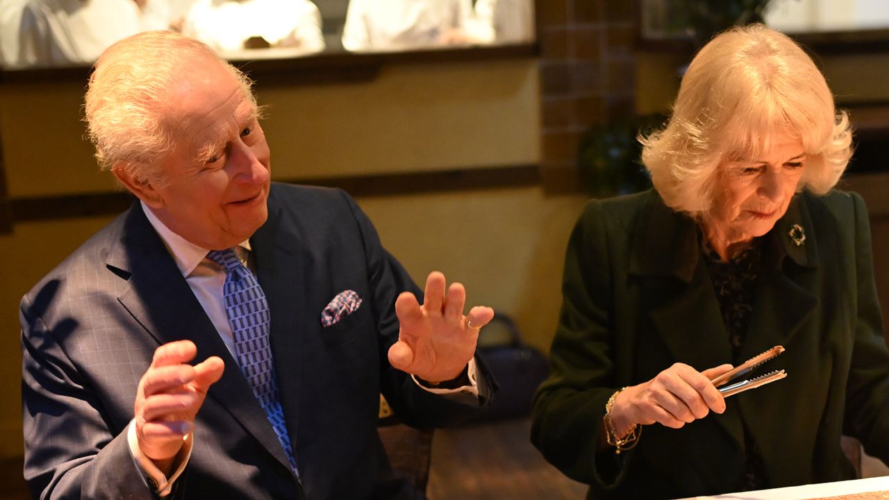 King Charles III and Queen Camilla meet British Muslim women at a female led restaurant and help pack donation boxes ahead of Ramadan, at Darjeeling Express, Kingly Court, Carnaby Street on February 26, 2025 in London, England