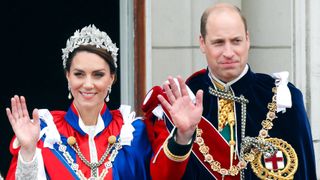 Catherine, Princess of Wales and Prince William watch an RAF flypast from the balcony of Buckingham Palace following the Coronation