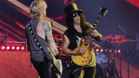 Duff McKagan (left) and Slash perform onstage
