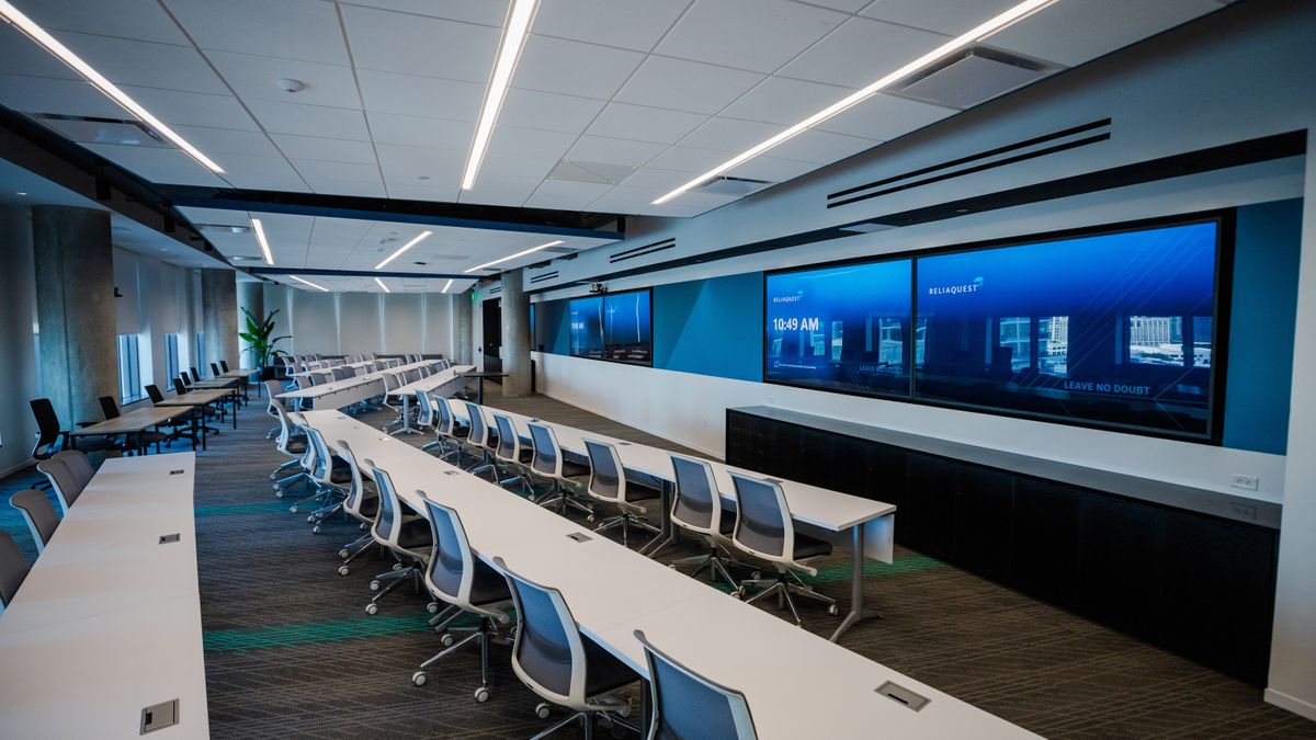 Sony BRAVIA displays bring a ReliaQuest meeting room to life. 