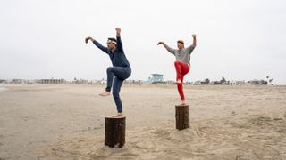 Johnny and Daniel make crane poses on stumps in Cobra Kai season 6 part 3