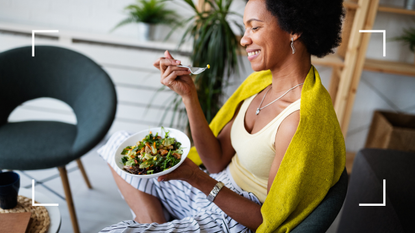 Woman eating bowl of healthy food