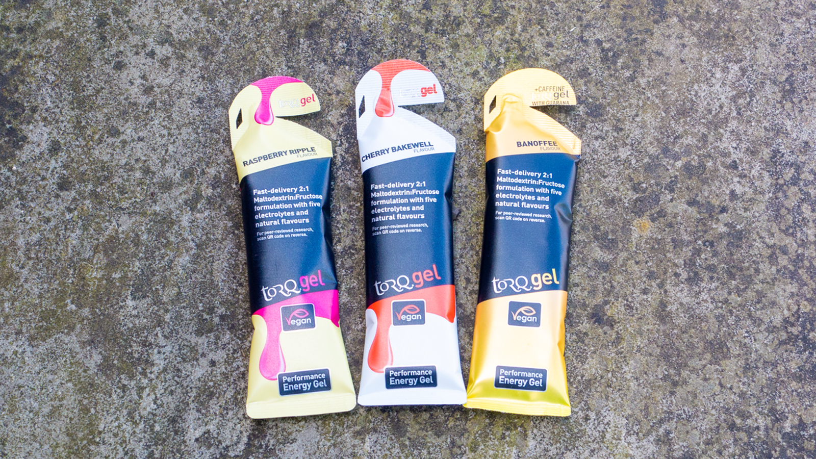 A trio of Torq Energy Gels on the floor