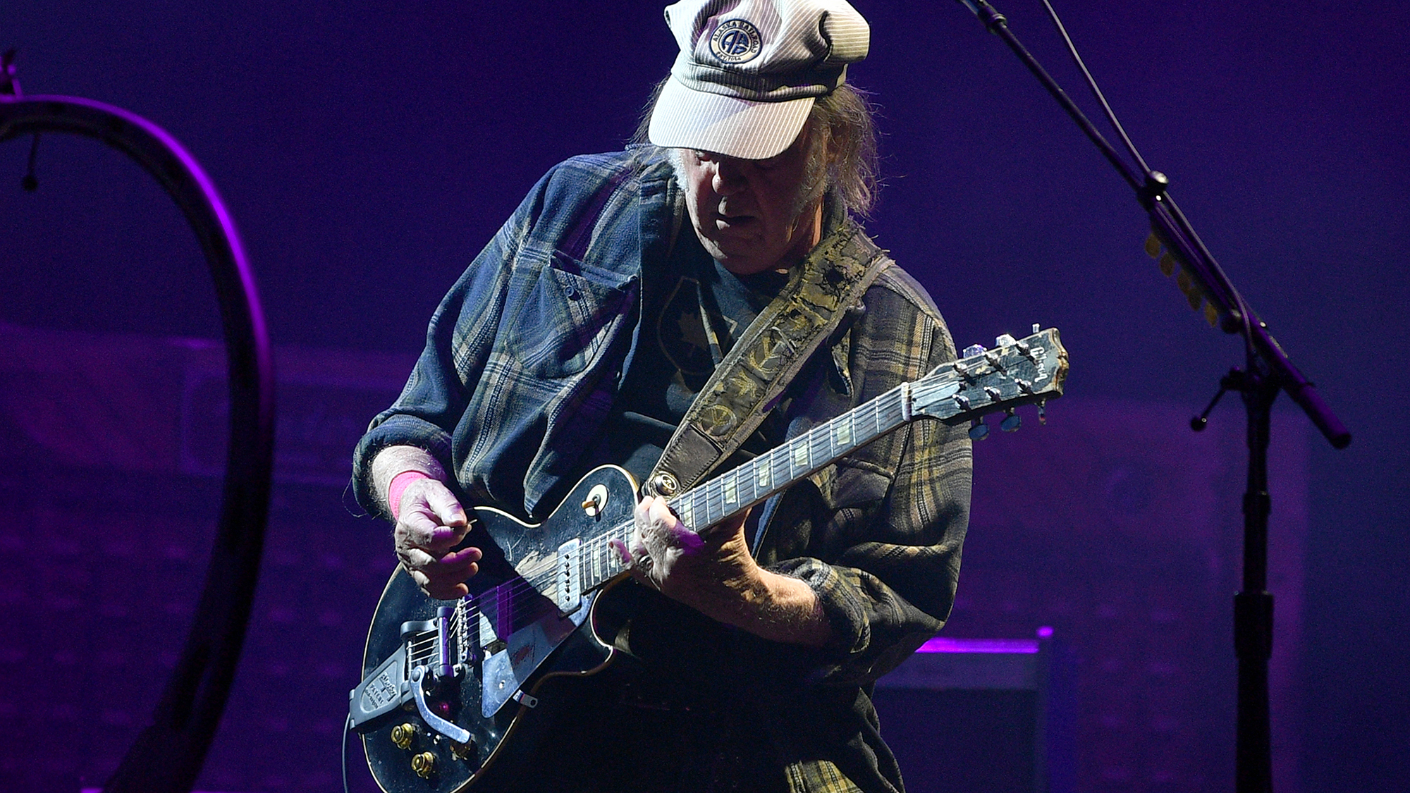Neil Young performs on the Pyramid stage during day four of Glastonbury festival 2025 at Worthy Farm, Pilton on June 28, 2025 in Glastonbury, England