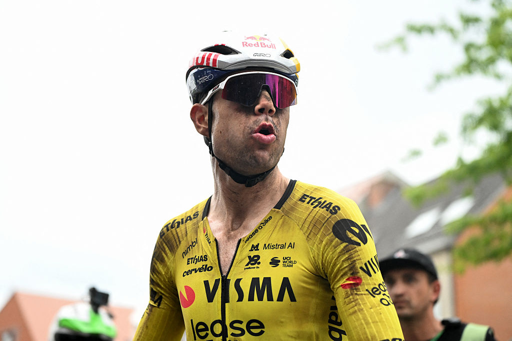 Team Visma-Lease a Bike's Belgian rider Wout van Aert reacts after finishing second in the men's elite race at the Belgian Gravel Championships in Grobbendonk on August 16, 2026. (Photo by ELIAS ROM / Belga / AFP) / Belgium OUT