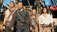 (L-R) Tom Hopper as William Manderly, Toby Stephens as Captain Flint, Mark Ryan as Hal Gates and Luke Arnold as Long John Silver in Black Sails now streaming Netflix