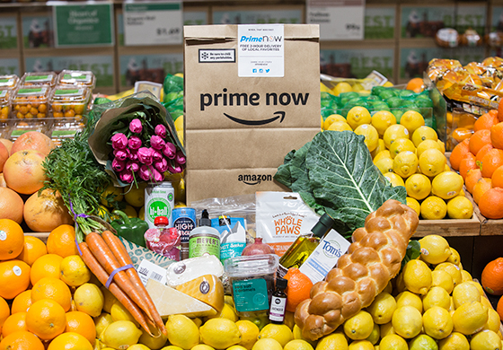 A Prime Now bag shown in front of produce