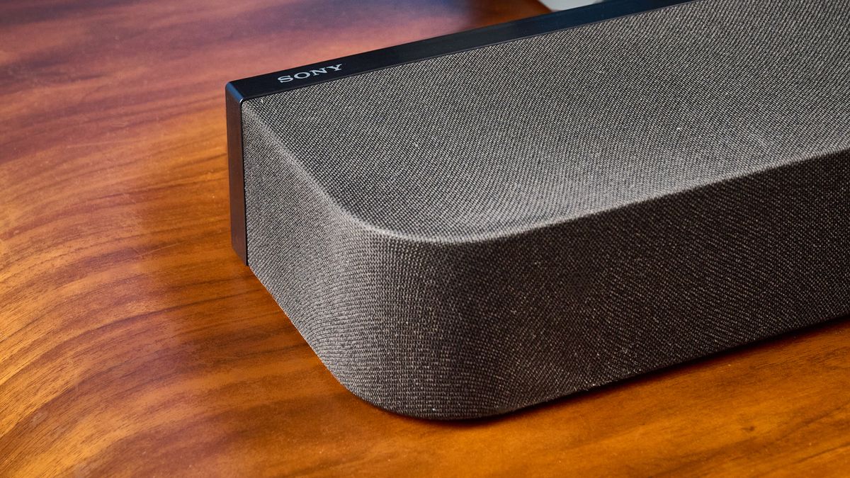 the sony bravia theater bar 7 photographed with the subwoofer with a TV on the tom's guide blue background
