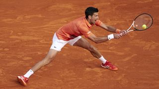 Novak Djokovic of Serbia returns a ball during the Rolex Monte-Carlo Masters at Monte-Carlo Country Club 