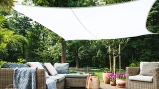 Shade sail over garden furniture