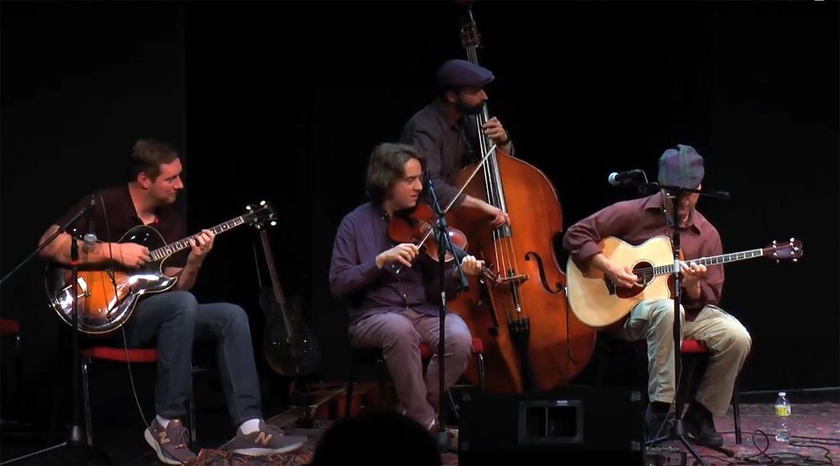 A photo showing tenor guitarists taken at one of the Tenor Guitar Foundation&#039;s annual Tenor Guitar Gatherings