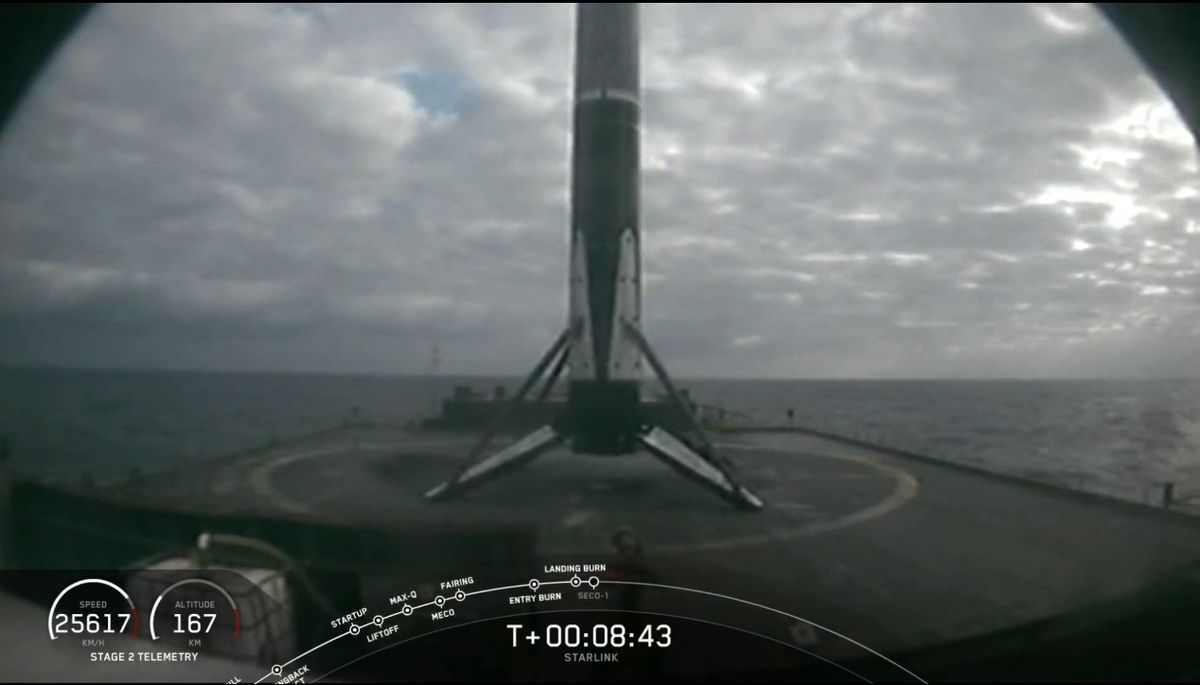 A SpaceX Falcon 9 rocket first stage is seen after landing on the drone ship Of Course I Still Love You for its sixth landing after launching 60 Starlink internet satellites from Launch Complex 39A of NASA's Kennedy Space Center in Cape Canaveral, Florida on Oct. 18, 2020.