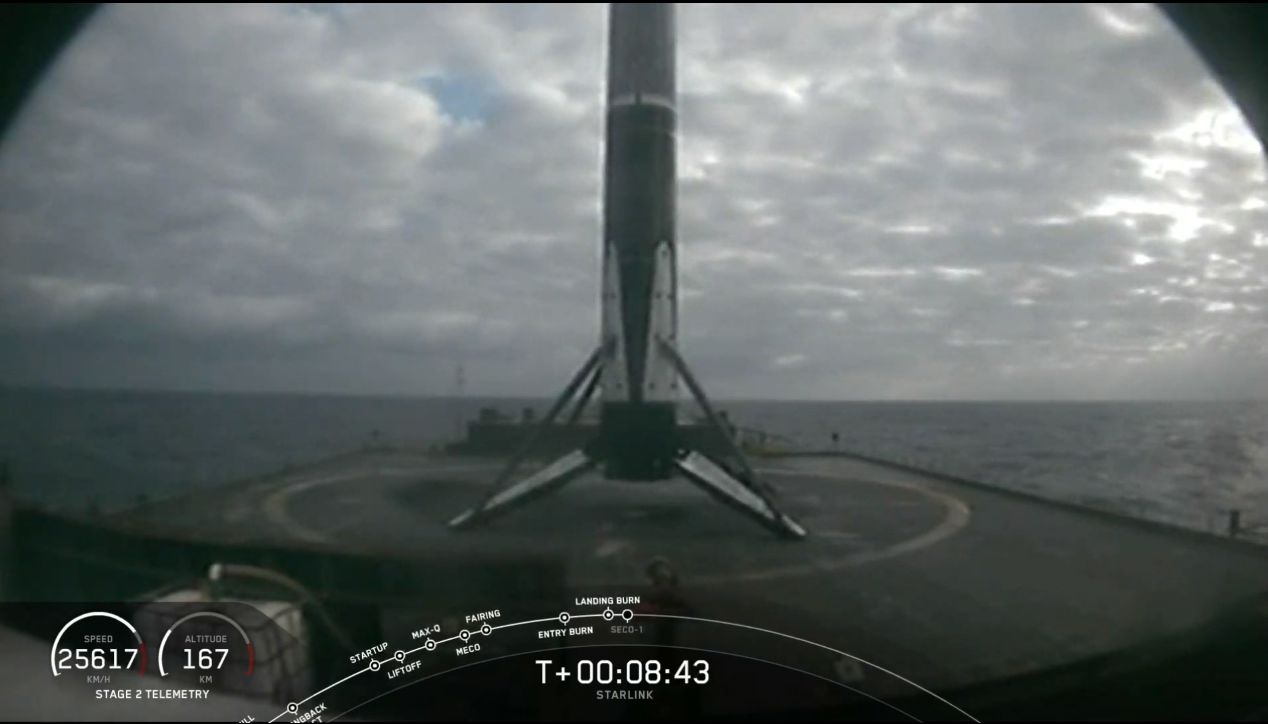 A SpaceX Falcon 9 rocket first stage is seen after landing on the drone ship Of Course I Still Love You for its sixth landing after launching 60 Starlink internet satellites from Launch Complex 39A of NASA's Kennedy Space Center in Cape Canaveral, Florida on Oct. 18, 2020.