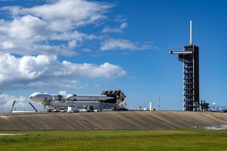 SpaceX rolls its Falcon Heavy rocket out to Launch Pad 39A at NASA's Kennedy Space Center in Florida, ahead of a planned Nov. 1 liftoff.