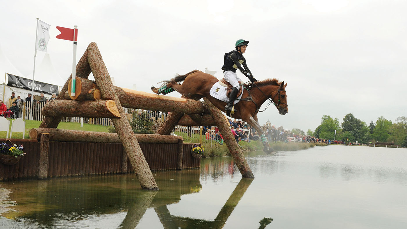 Ireland&amp;rsquo;s Cathal Daniels jumps into The Lake at Badminton on Rioghan Rua.
