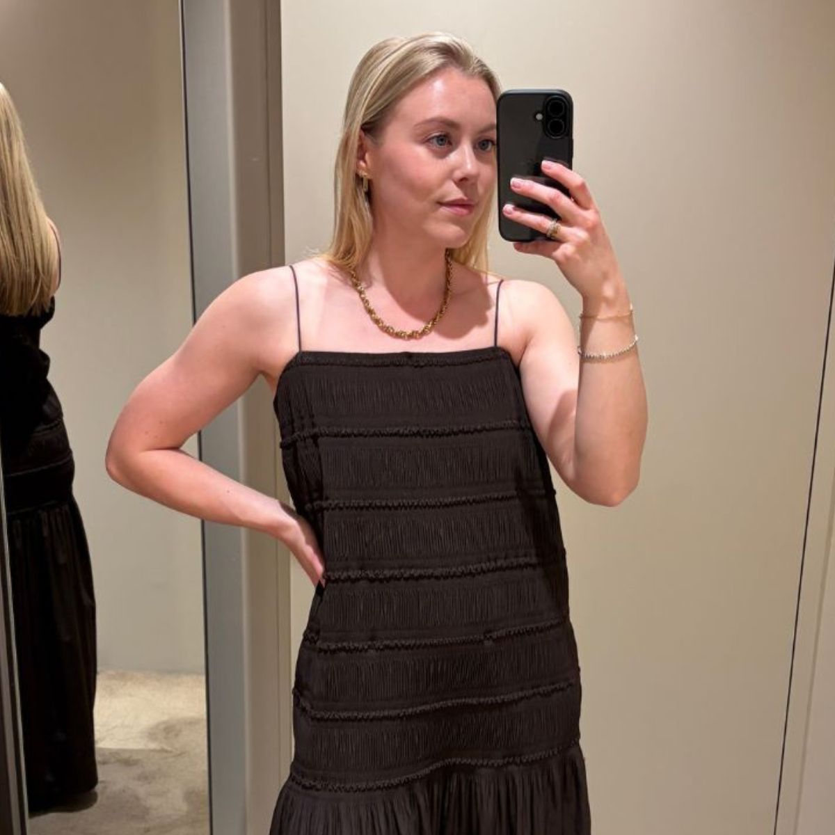 Woman wears brown textured dress from COS summer 2026 collection