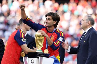 Ferran Torres lays hands on the World Cup trophy after scoring the winner against Argentina in the 2026 final