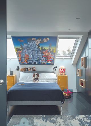 A bedroom with grey stained floor