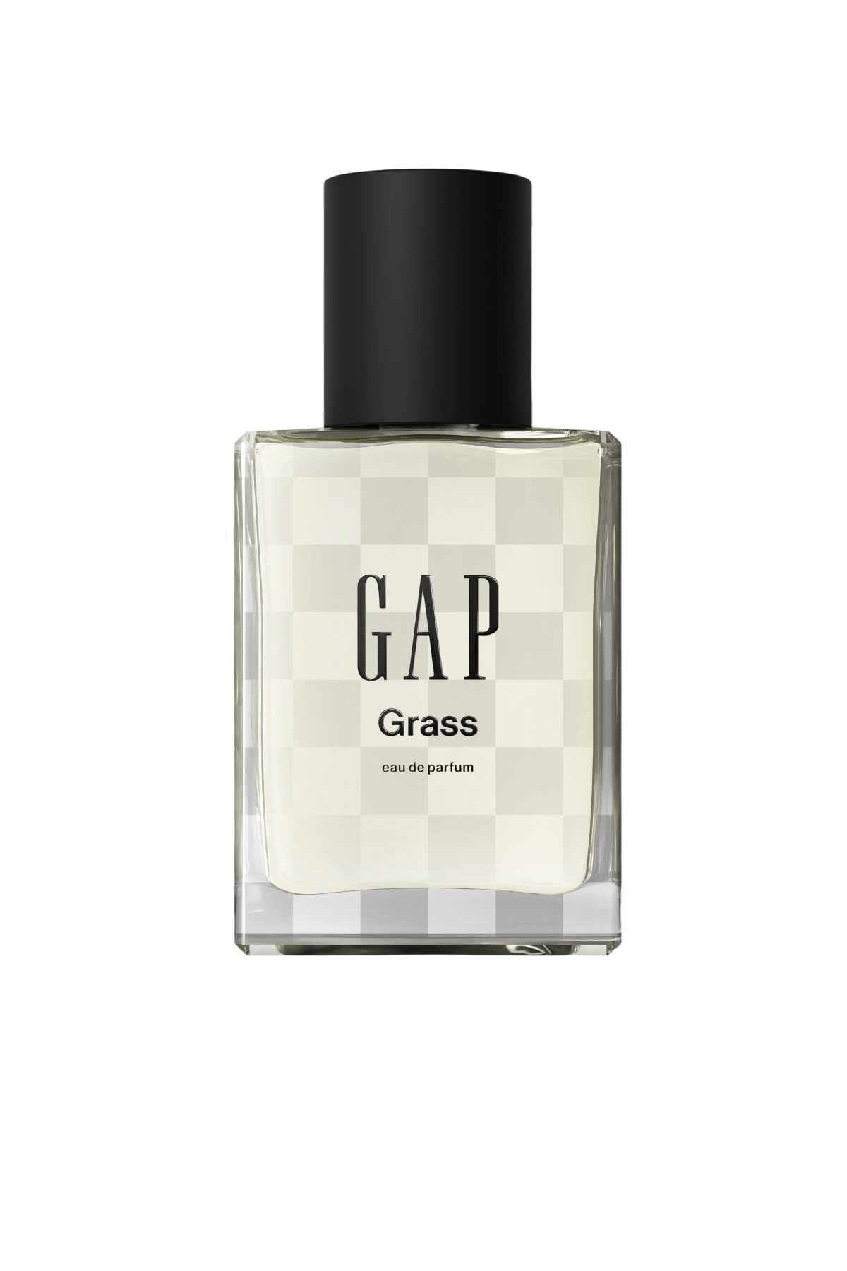 a clear glass bottle of Gap Grass perfume