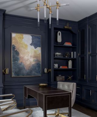 formal and traditional home office painted dark navy blue