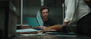 Tom Holland as Peter Parker and a person who may be Charlie Cox as Matt Murdock in Spider-Man: No Way Home`
