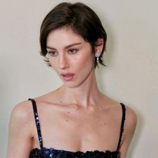 Gracie Abrams with a short elfin bob haircut