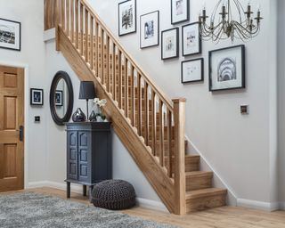 A white oak stair railing idea by Richard Burbridge in white oak