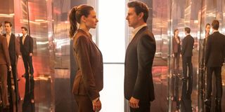 Rebecca Ferguson and Tom Cruise facing off in a mirrored room in Mission: impossible - Fallout.