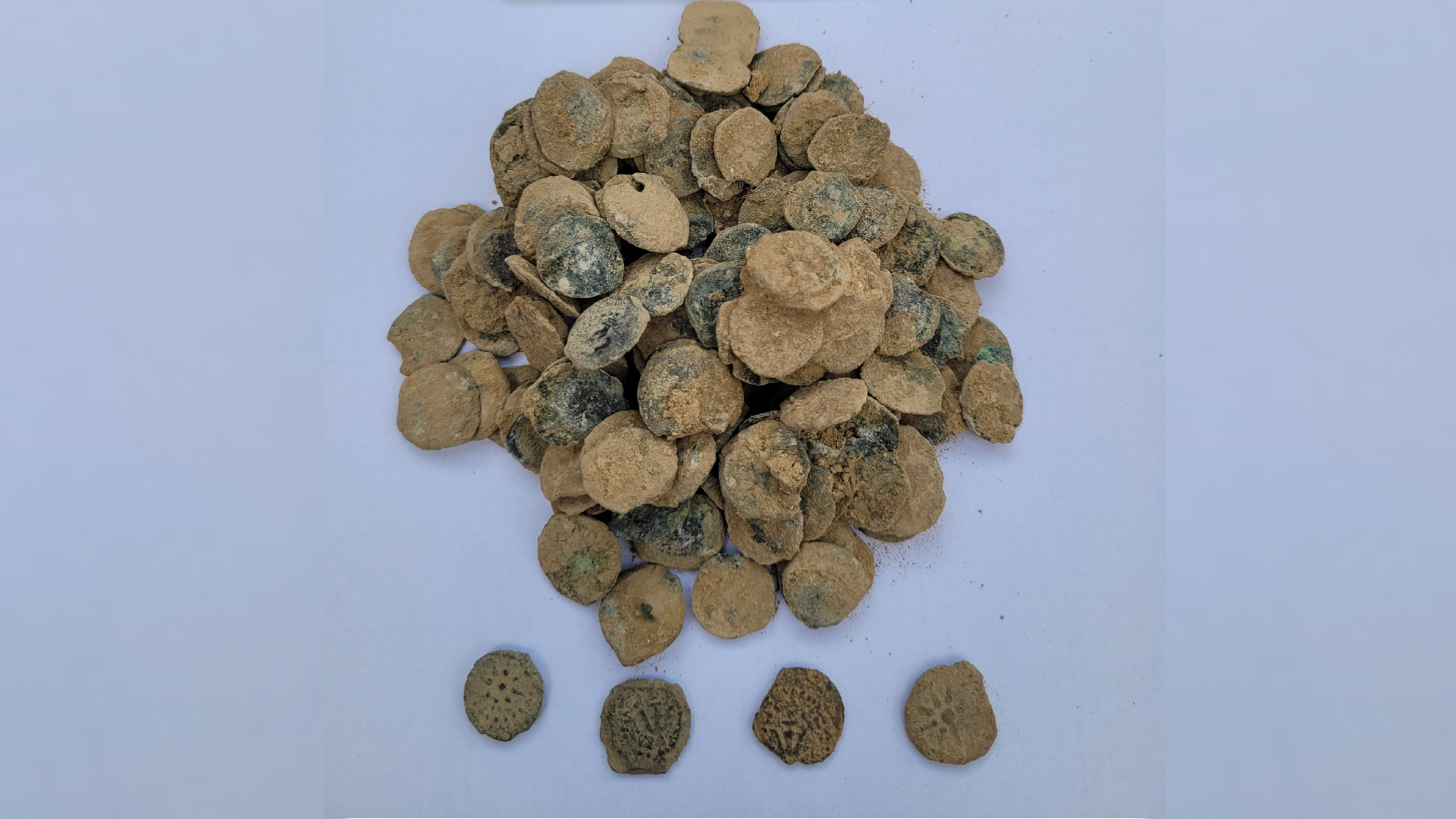 2,100-year-old coin hoard dating to dynasty of Jewish kings discovered in Jordan Valley