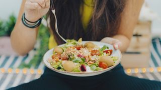 woman eating a salad